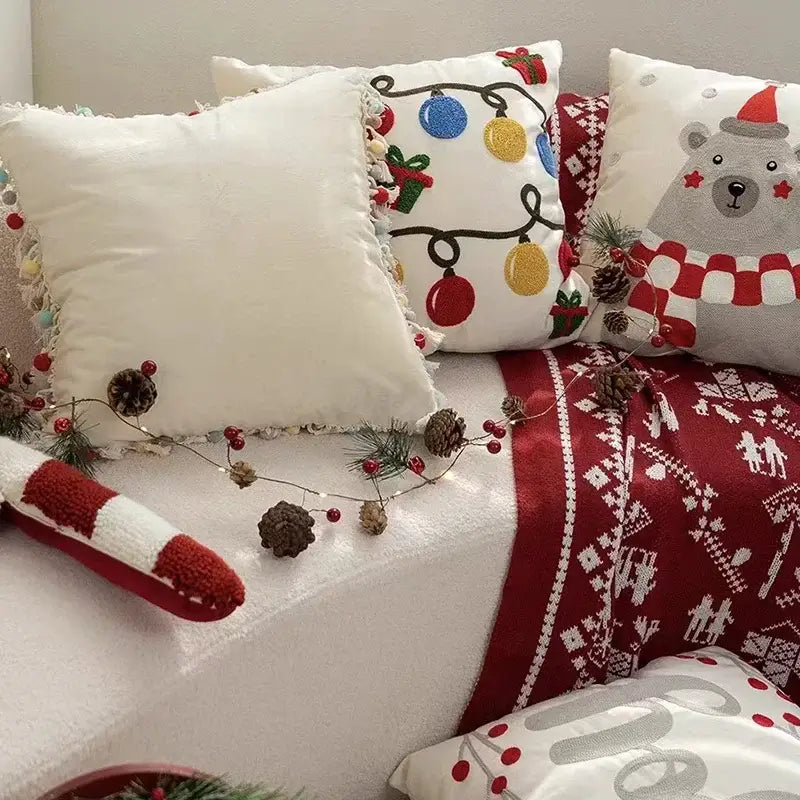White decorbites christmas bell pillow cover with embroidered festive lights and red berries for holiday decor