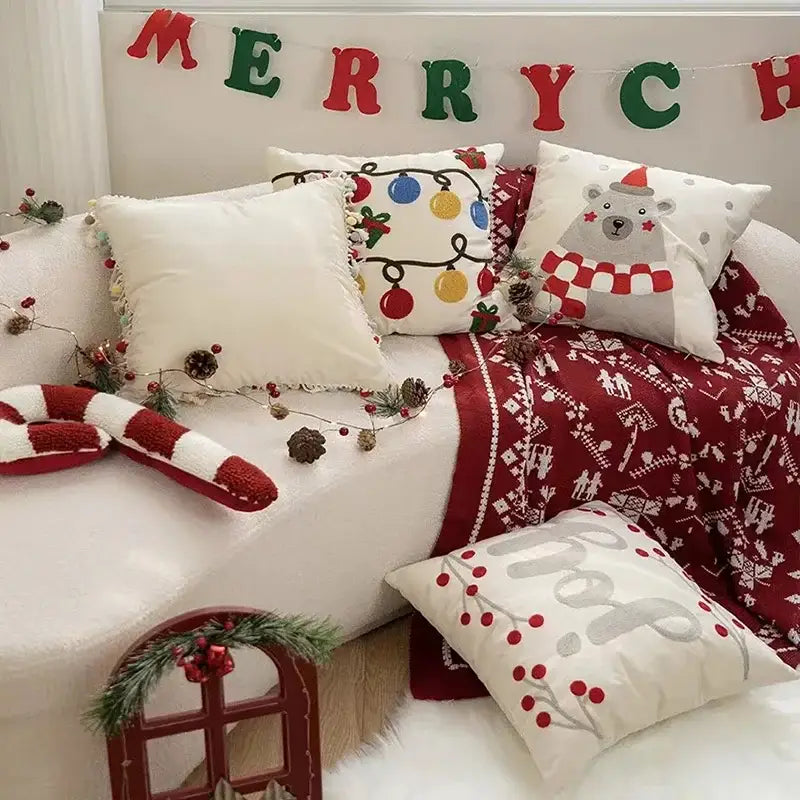 White plush pillow cover with embroidered red berries and gray branch decorbites christmas bell red design