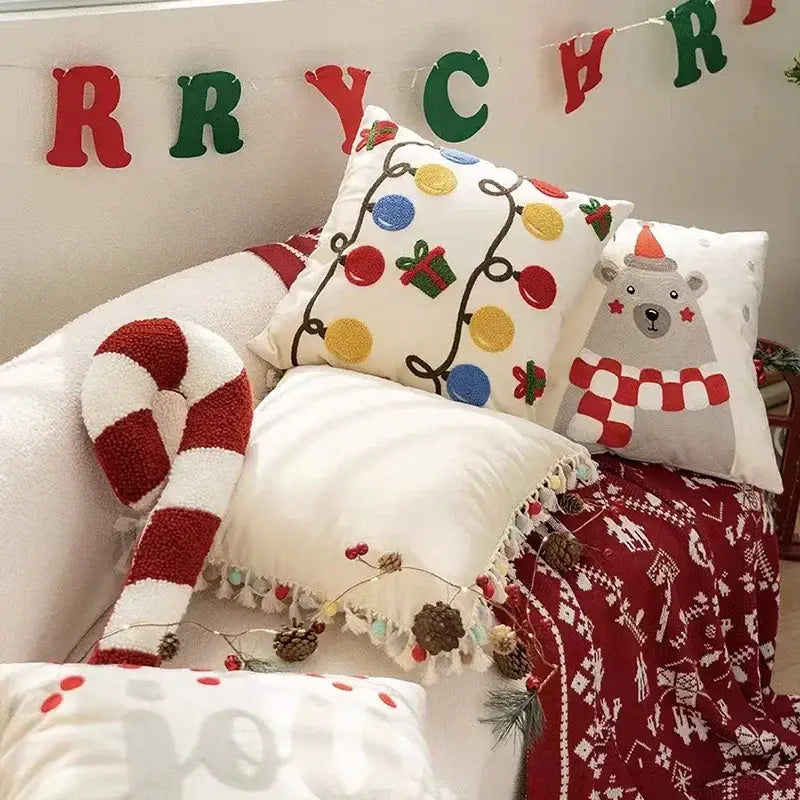 White cushion pillow cover with embroidered christmas lights and colorful ornaments from decorbites christmas bell red collection