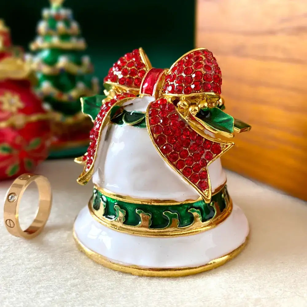 Decorbites™ white enamel christmas bell trinket box with red rhinestone bow and gold holly accents for jewelry storage