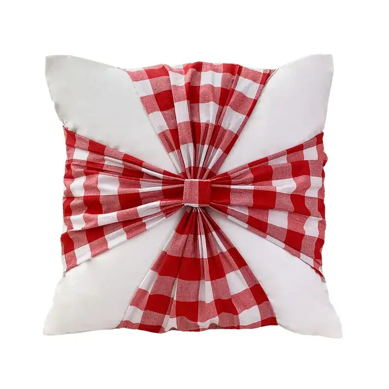 Decorbites christmas bow patchwork velvet pillow cover set featuring a red and white checkered bow on a white cushion