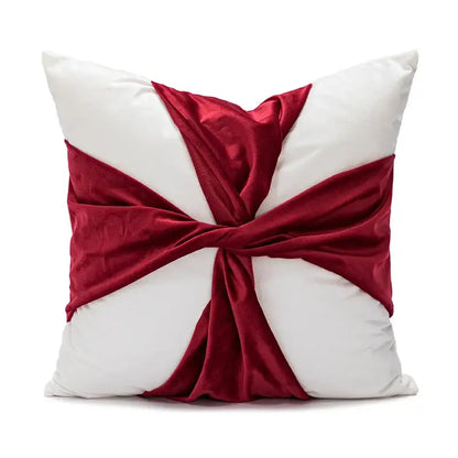 White cushion with bold deep red velvet ribbon tied in cross knot decorbites christmas bow patchwork velvet pillow cover set