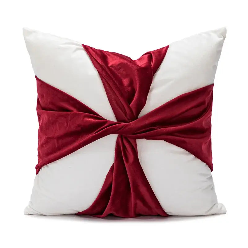 White cushion with bold deep red velvet ribbon tied in cross knot decorbites christmas bow patchwork velvet pillow cover set