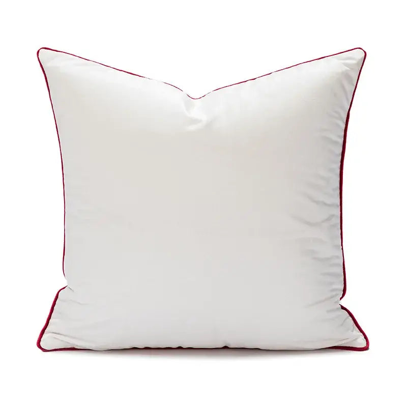 White square pillow with subtle sheen and burgundy piping from decorbites christmas bow patchwork velvet set