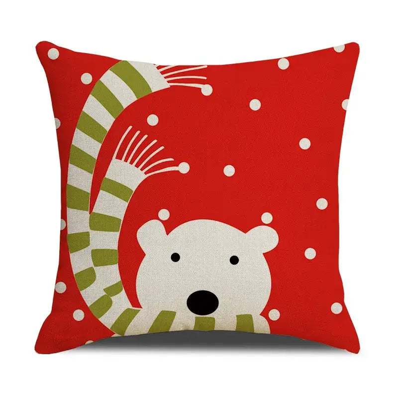 Red cushion with a white polar bear wearing a green striped scarf on polka dots in decorbites christmas cartoon linen pillowcase