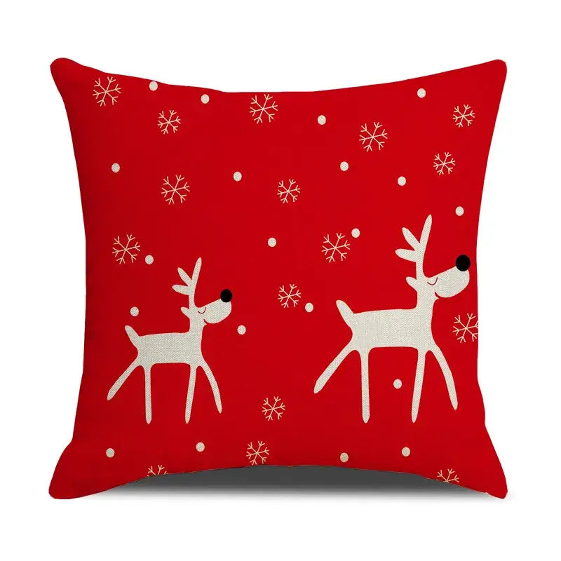 Red cushion with white reindeer and snowflake patterns in decorbites christmas cartoon animal linen pillowcase design