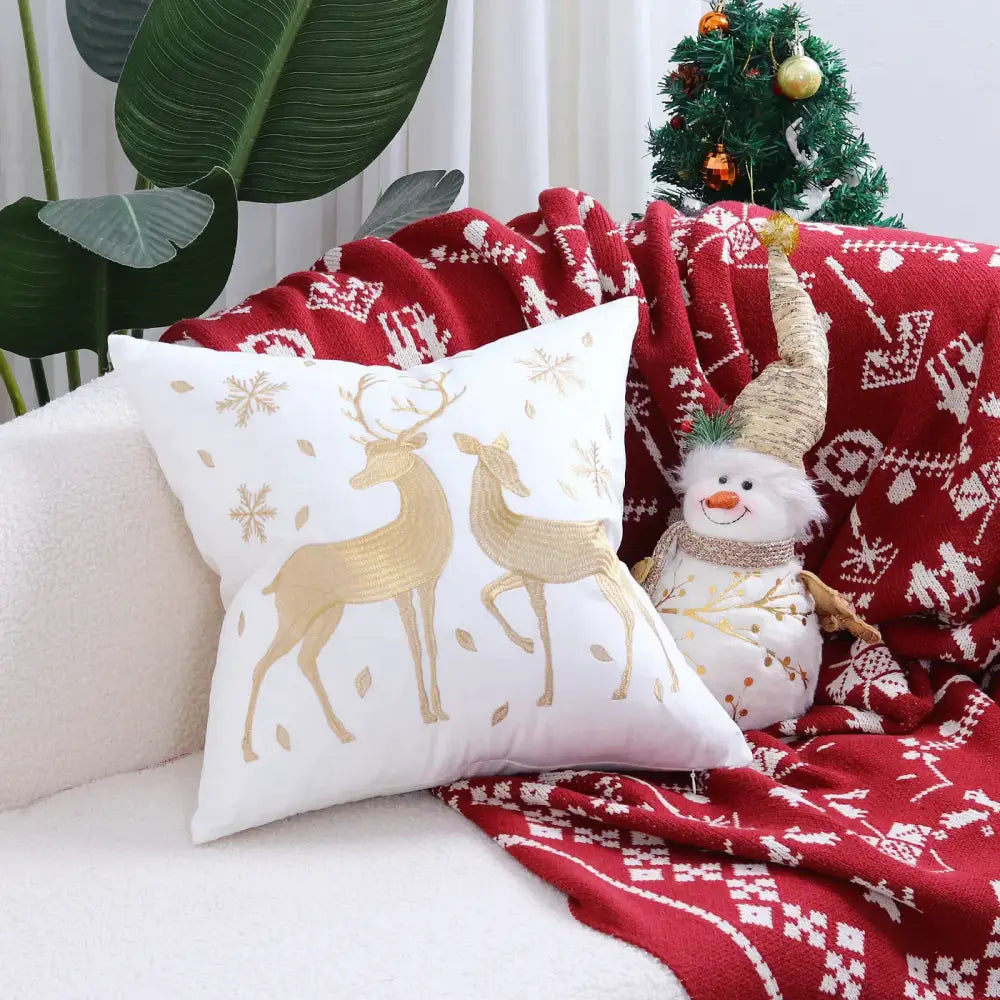 White pillow cover with embroidered gold deer and snowflake patterns for decorbites christmas cartoon festive decor