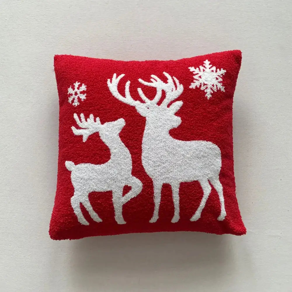 Red plush embroidered pillow with silver reindeer and snowflakes from decorbites christmas cartoon set