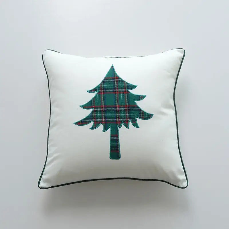 White square pillow cover with green and red plaid christmas tree appliqué and black piping decorbites christmas cartoon