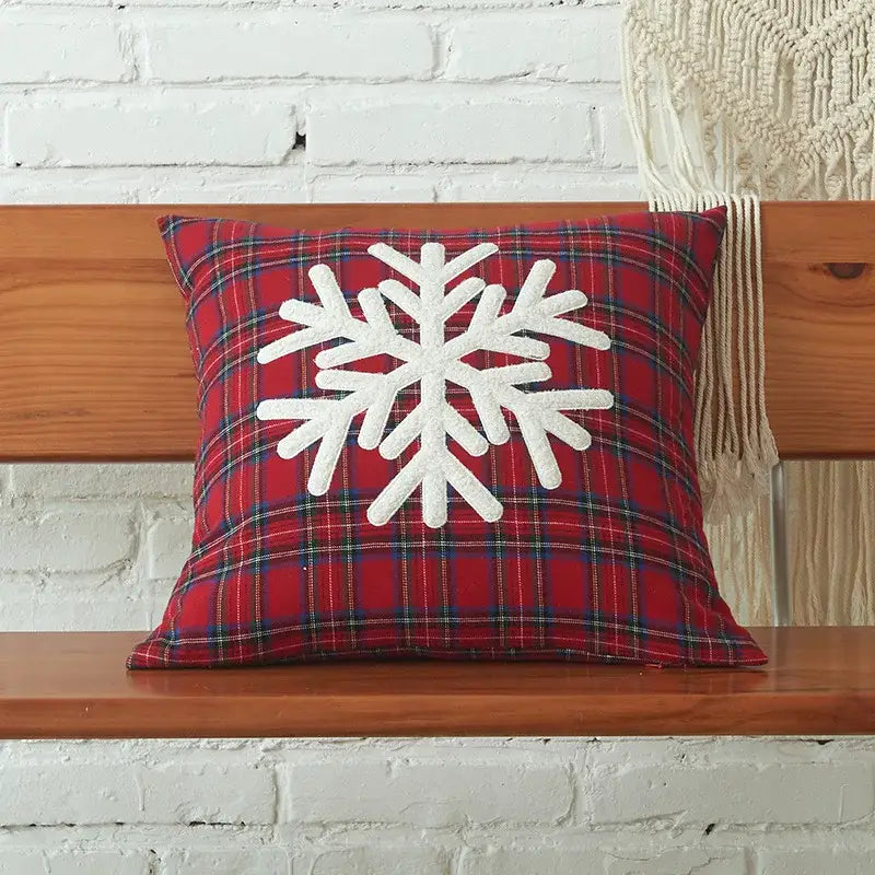 Red plaid pillow cover with white embroidered snowflake design from DecorBites Christmas cartoon letter collection