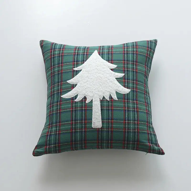 Square pillow cover with green and red plaid fabric and white textured christmas tree appliqué by DecorBites Christmas cartoon