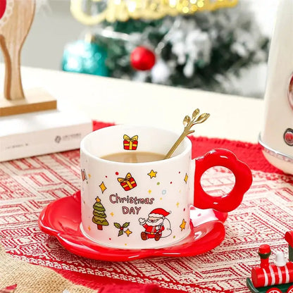 White ceramic christmas ceramic santa tea set by decorbites featuring a mug with red handle and festive saucer