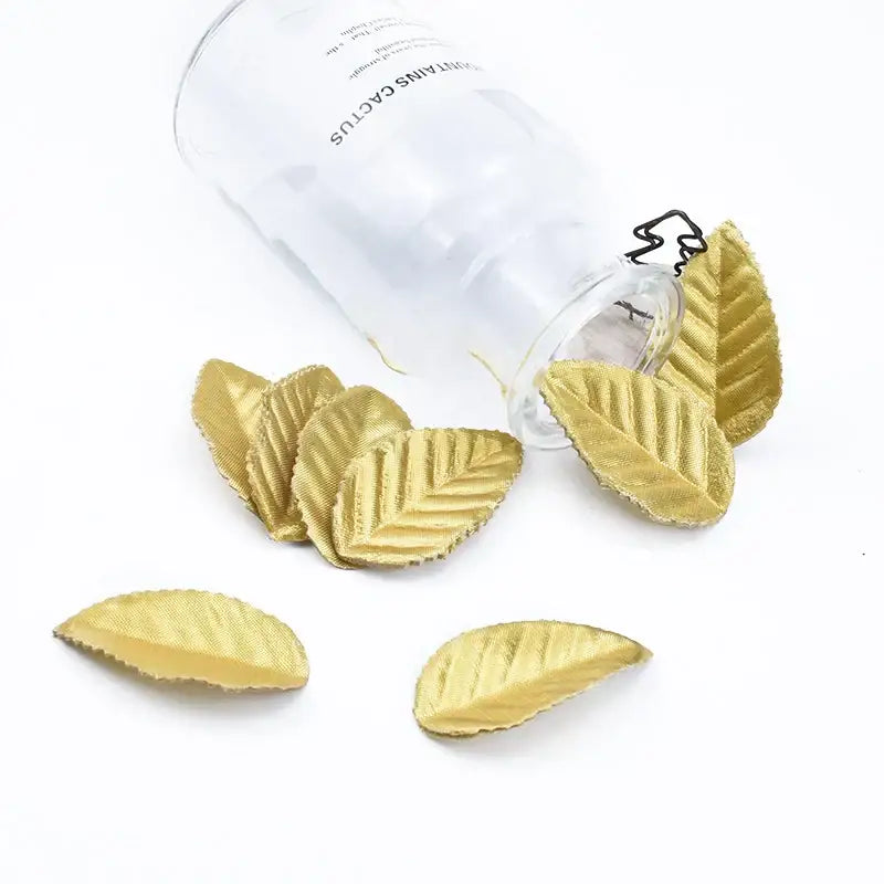 Golden decorbites christmas crafts silk leaf with textured ribbed surface and frayed edges for decorative use