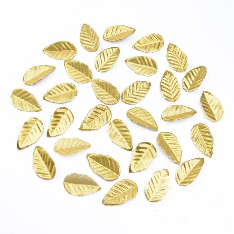 Gold leaf-shaped embellishments with embossed veins in decorbites christmas crafts silk leaf for holiday wreaths and decor
