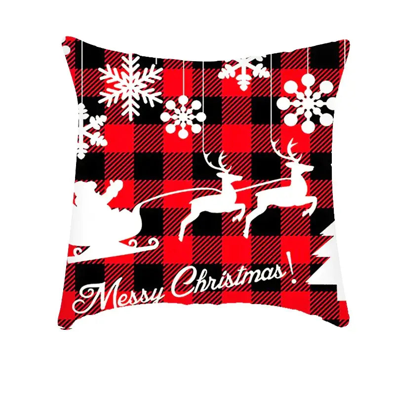 Red and black plaid decorbites christmas cushion cover featuring white snowflakes reindeer santa and messy christmas text