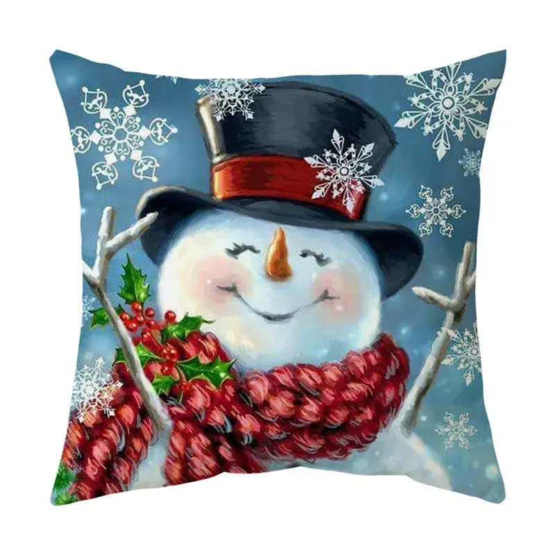 DecorBites christmas cushion cover set featuring a cozy blue pillow with a cheerful snowman and snowflake design