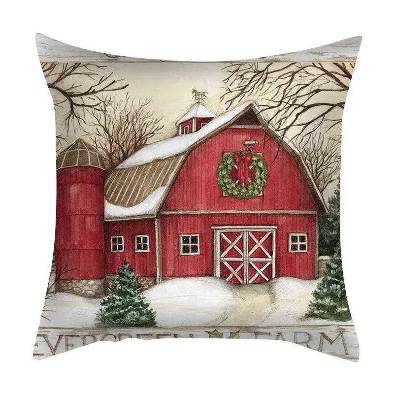 Decorbites christmas cushion featuring red barn design with snow-covered roof and green wreath christmas cushion cover set