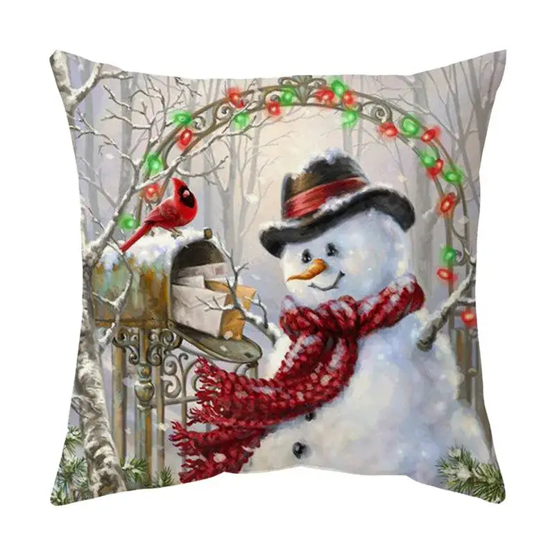 White snowman pillow with red scarf and black hat featuring cardinal on mailbox in decorbites christmas cushion cover set