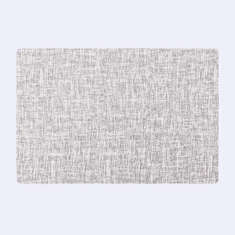 Rectangular gray woven christmas decor placemat with textured linen-like fabric from decorbites christmas collection