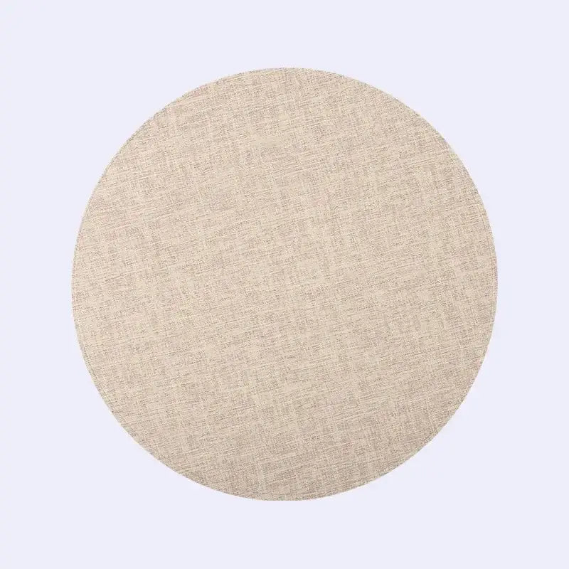 Beige circular placemat with subtle woven texture from decorbites christmas decor placemat set for elegant dining