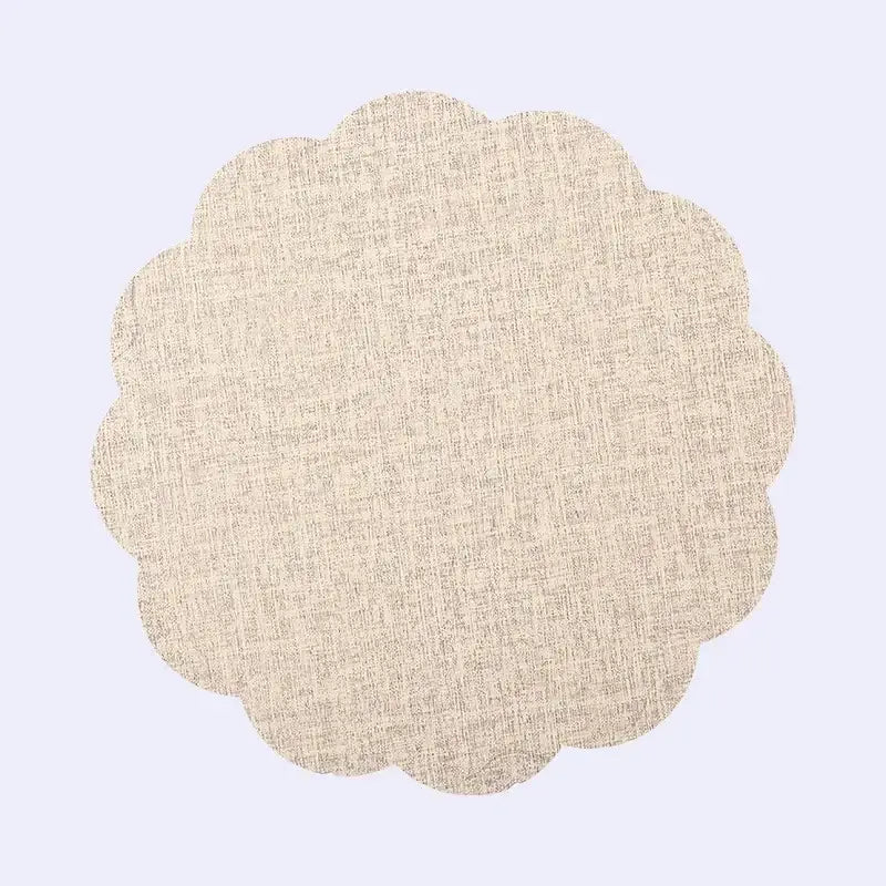 Beige scalloped-edge fabric placemat with subtle woven texture from decorbites christmas decor placemat set