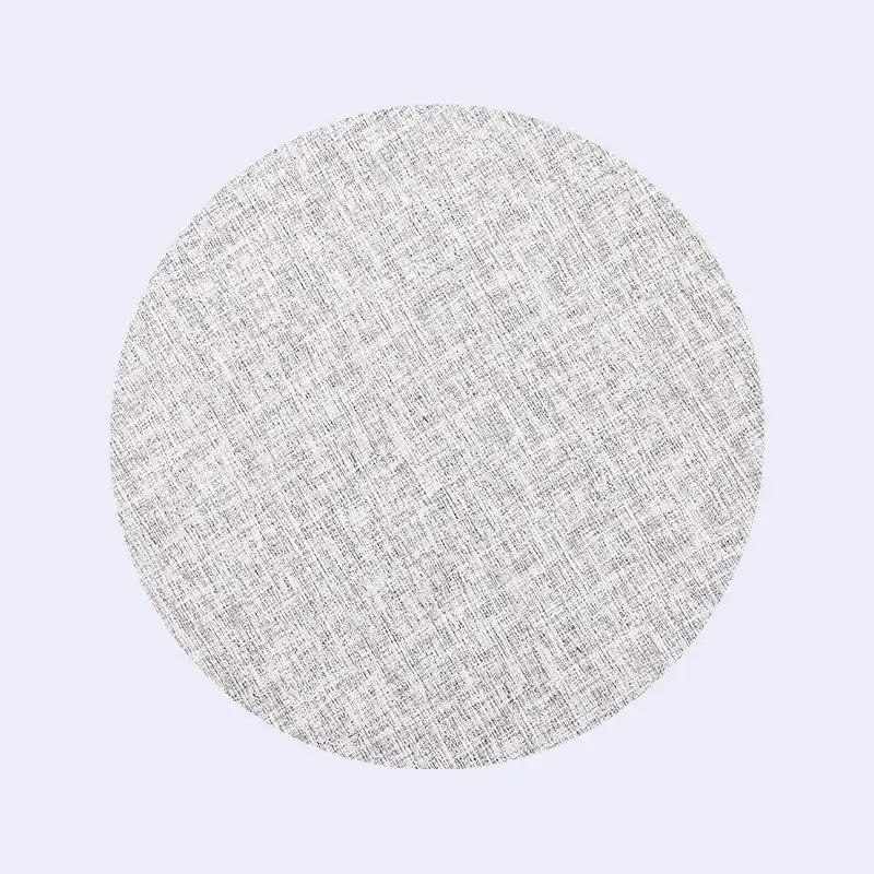 A circular light gray textured fabric sample with subtle woven pattern for decorbites christmas decor placemat set