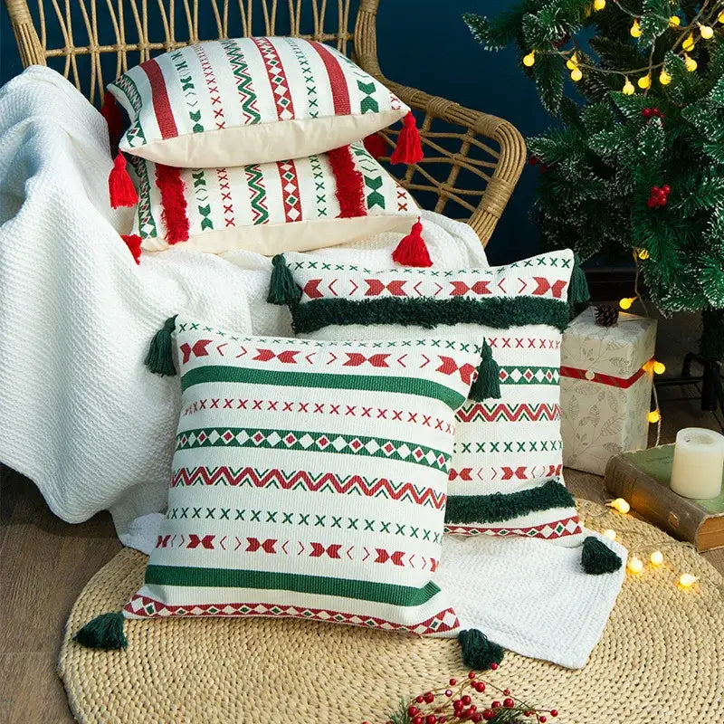 White throw pillow cushion cover with red and green geometric patterns and handmade tassels from decorbites christmas decoration