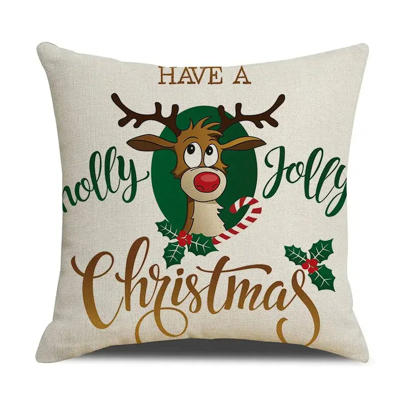 Beige linen cushion cover featuring a decorbites christmas deer with antlers red nose candy cane holly leaves in gold lettering