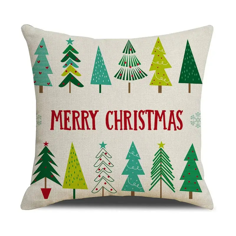 Beige linen cushion cover with festive green and teal christmas trees and red merry christmas text from decorbites christmas deer collection