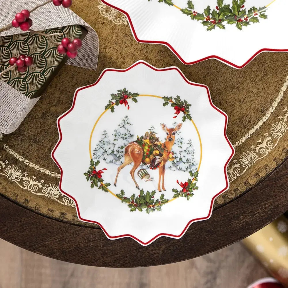 White ceramic plate with scalloped edge featuring festive deer and holly from decorbites christmas dinnerware set