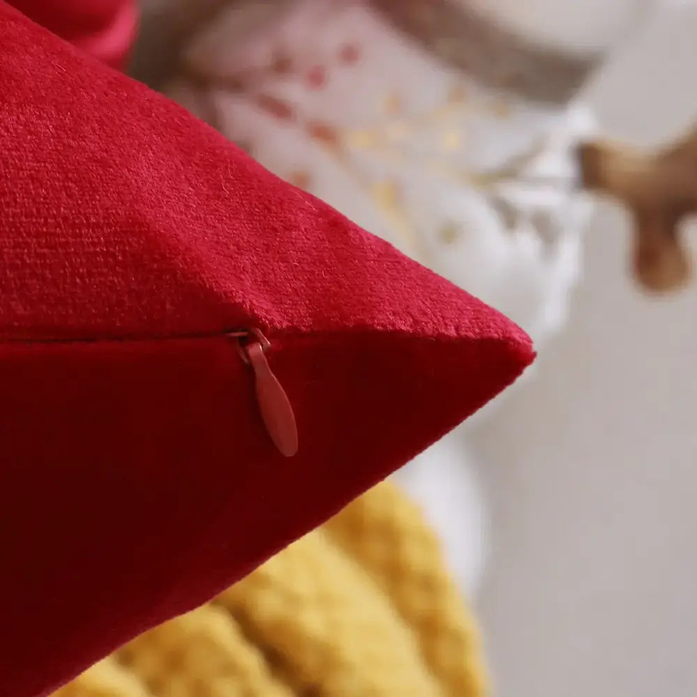 Vibrant red velvet christmas elk pillow cover by decorbites featuring matching zipper pull for festive decor