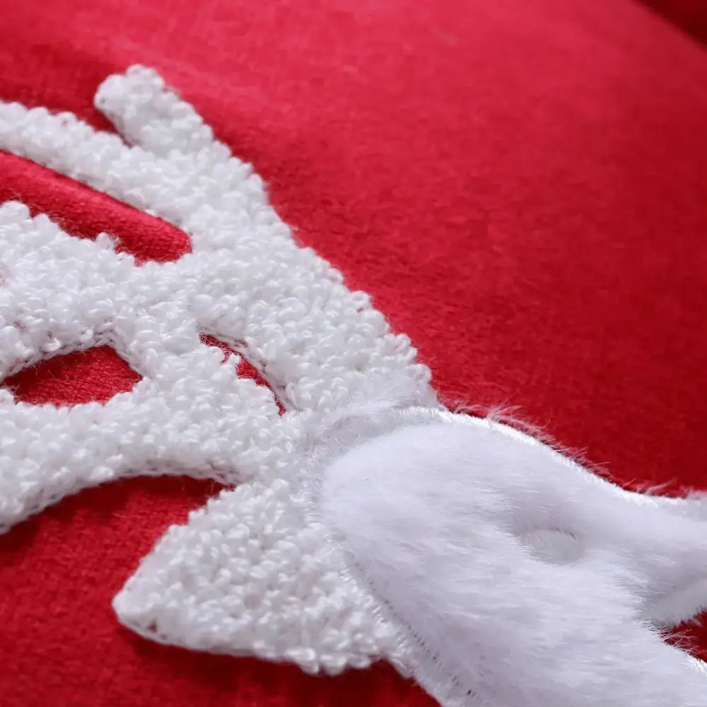 Decorbites christmas elk white fluffy embroidered reindeer antlers pillow cover on vibrant red fabric background