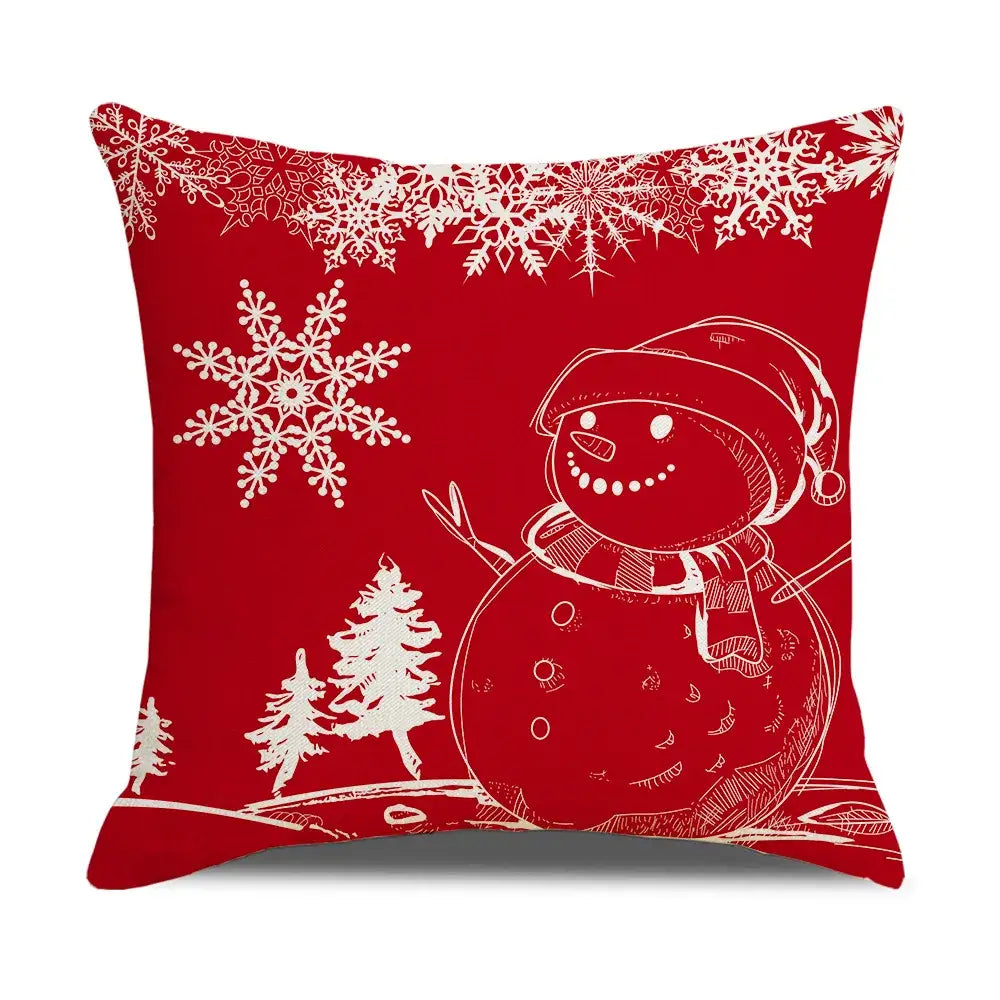 Red holiday throw pillow by DecorBites Christmas elk featuring white snowman line-art with snowflakes and pine trees