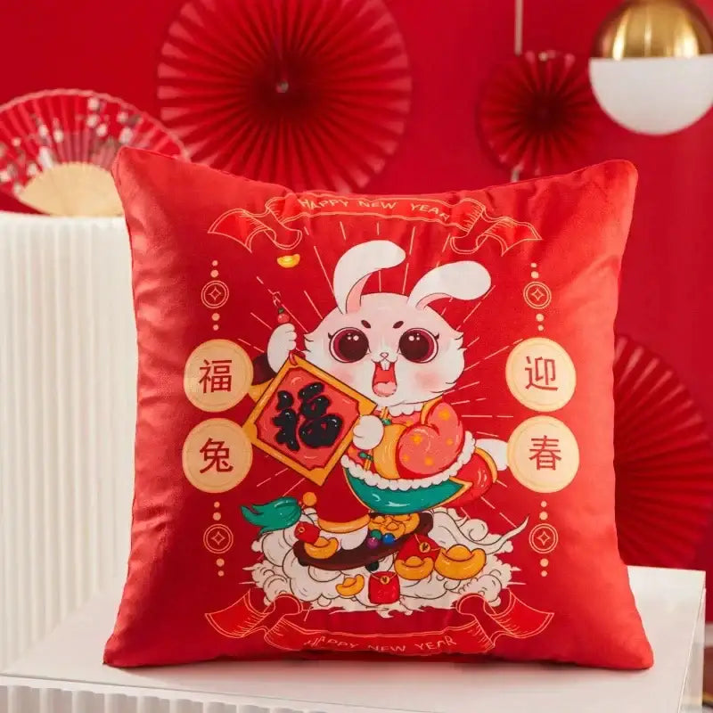Red satin cushion with cartoon rabbit holding red calligraphy scroll and festive chinese characters for DecorBites Christmas elk pillowcase red letter design