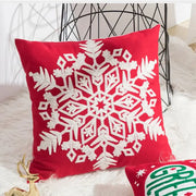 Red velvet cushion cover with intricate white embroidered snowflake design by decorbites christmas embroidered collection