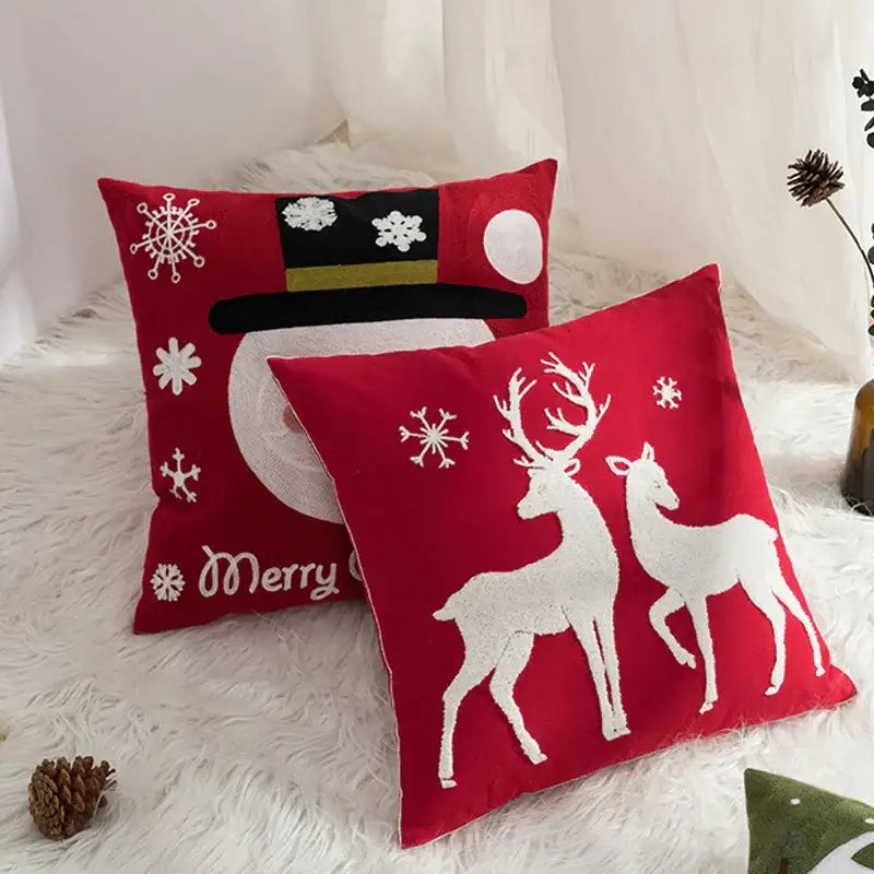 Red decorbites christmas embroidered cushion cover 45x45cm featuring white snowflakes reindeer and snowman design