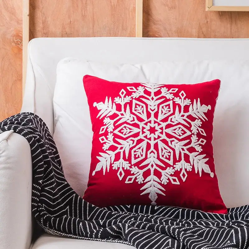 Decorbites christmas embroidered red velvet cushion cover with intricate white embroidered snowflake design
