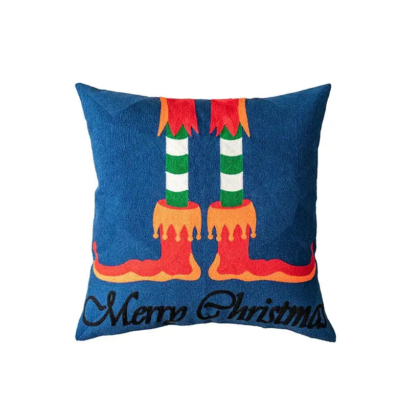 Blue embroidered christmas pillow cover by decorbites featuring festive elf legs and merry christmas script in black