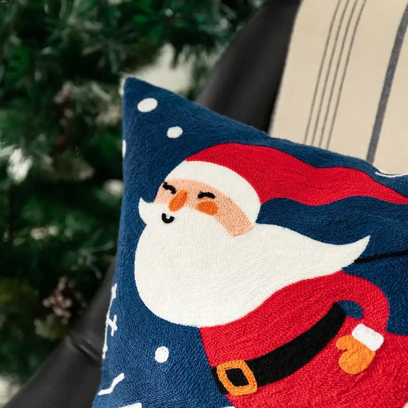 Blue decorbites christmas embroidered pillow cover featuring cheerful santa claus and snowflakes for holiday decor