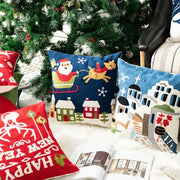 Blue pillow cover featuring decorbites christmas embroidered santa claus in sleigh over snowy houses design