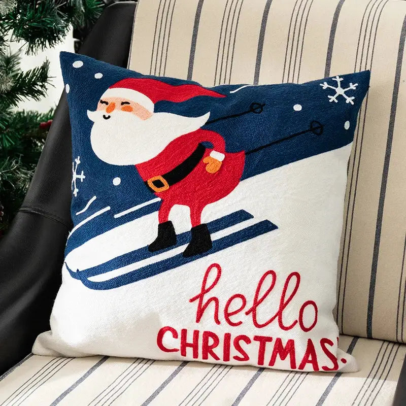 Cozy navy and white decorbites christmas embroidered pillow cover with cheerful santa skiing design and hello christmas text