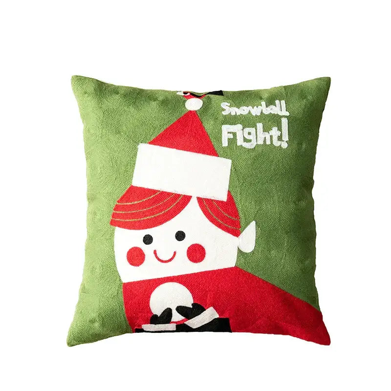Green plush pillow cover from DecorBites Christmas embroidered set featuring elf with snowball and snowball fight text