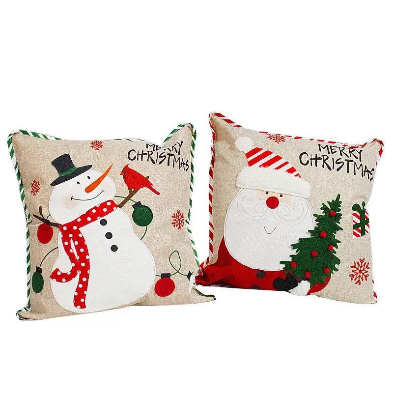 Set of two decorbites christmas embroidered throw pillows with snowman and santa designs on beige linen fabric