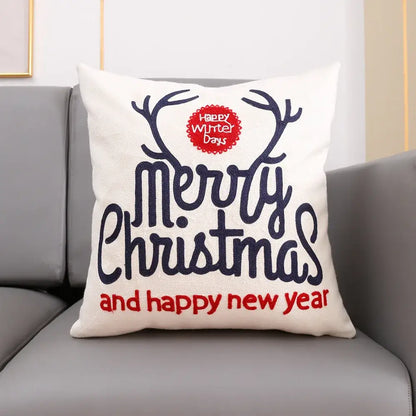 White cotton cushion cover with decorbites christmas embroidery merry christmas text and reindeer antlers design