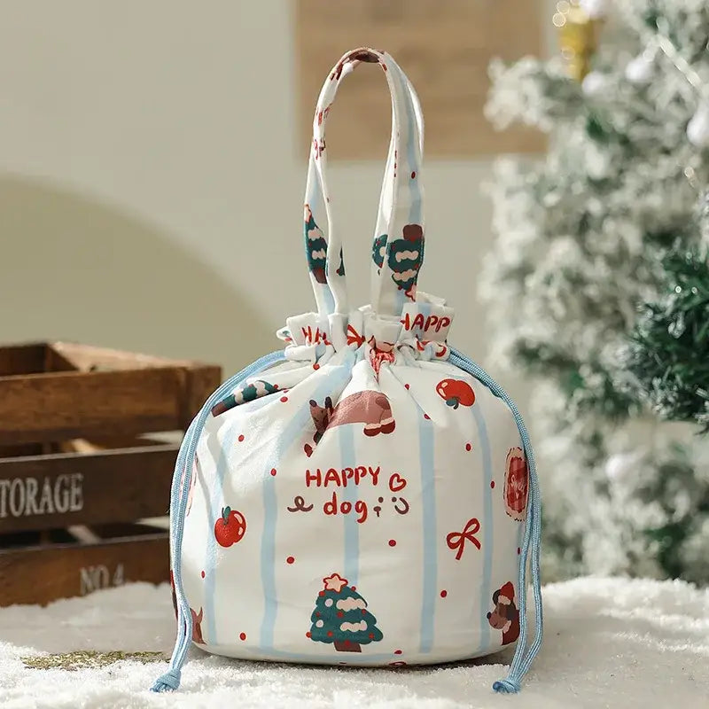 White drawstring apple bag with light blue stripes and festive christmas eve prints by decorbites christmas eve