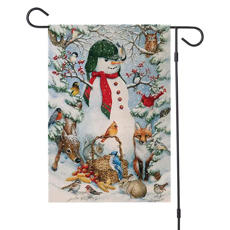 A decorbites christmas festive garden flag featuring a snowman with woodland animals on snowy branches 30 by 45 cm