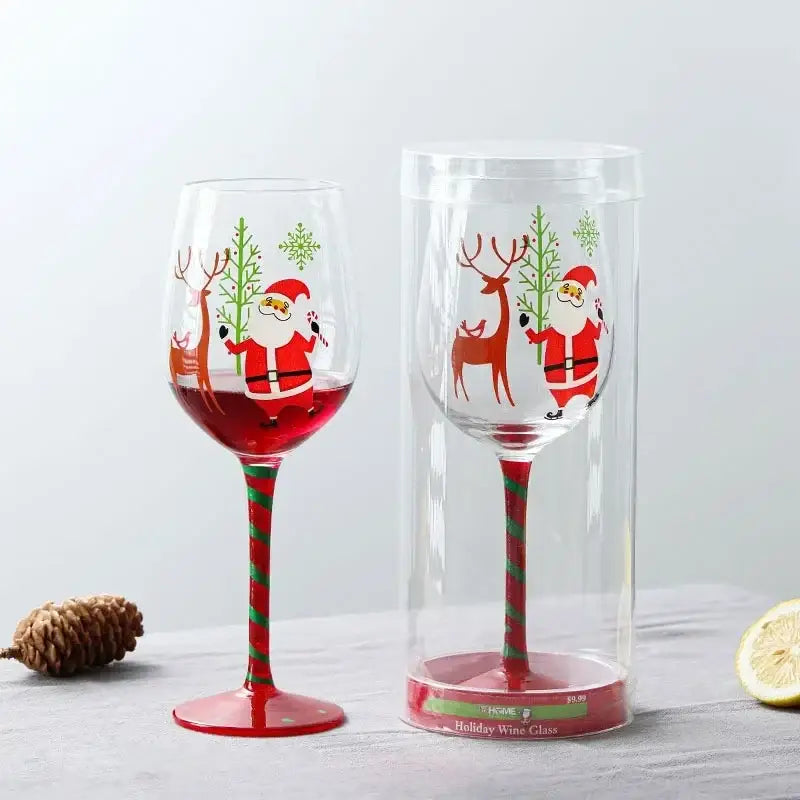 Decorbites™ christmas glass goblet set featuring festive cartoon santa and reindeer with red and green striped stem