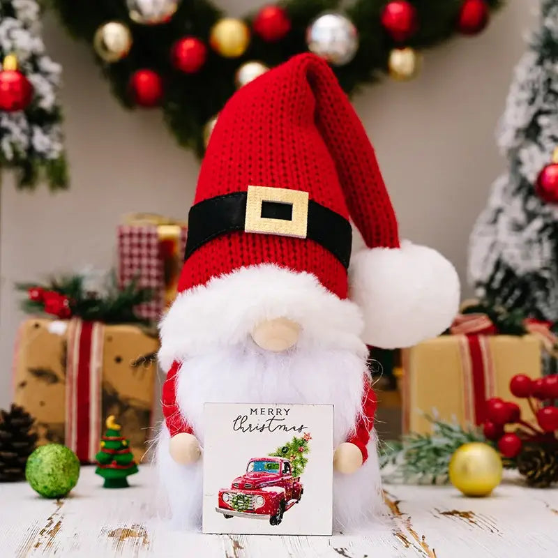 Decorbites christmas gnome doll with red knitted santa hat, black belt, gold buckle, and fluffy white beard