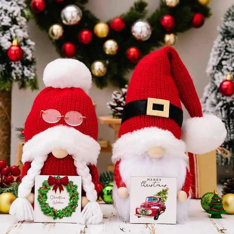 Two festive red knitted christmas gnome dolls with white beards and hats by decorbites for holiday home decor