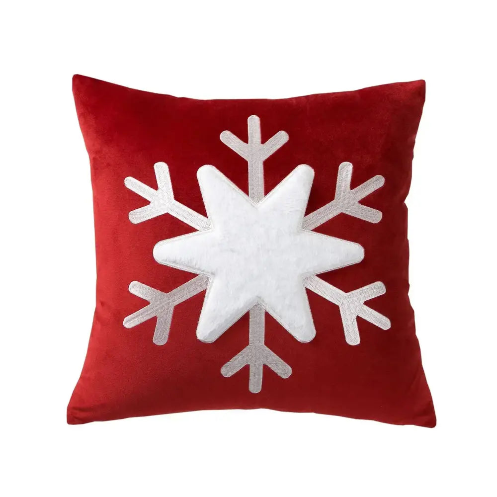 Red velvet pillow cover with a white snowflake appliqué and silver trim from decorbites christmas jacquard elk collection